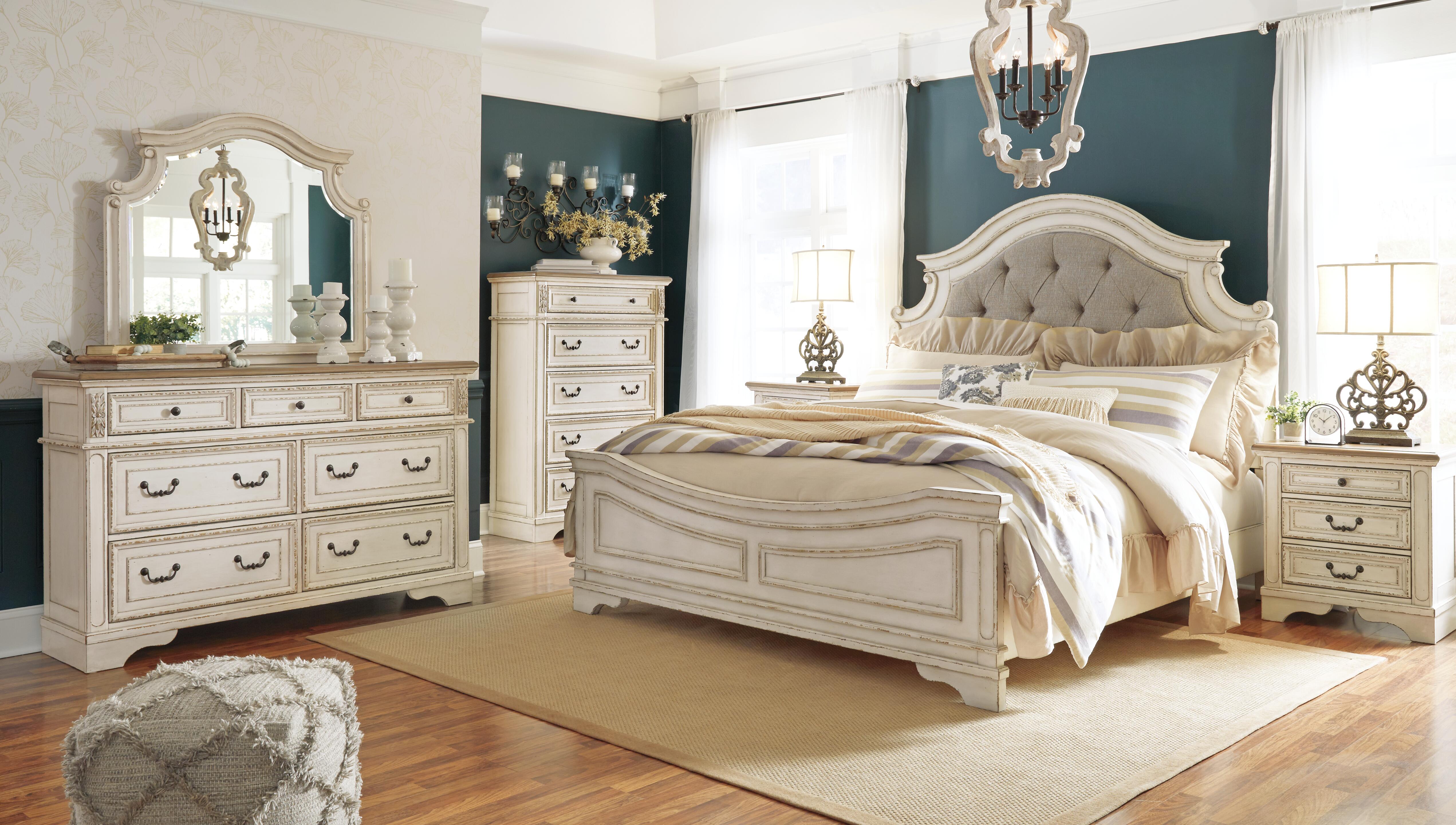 Realyn Upholstered Panel Bed Bedroom Set