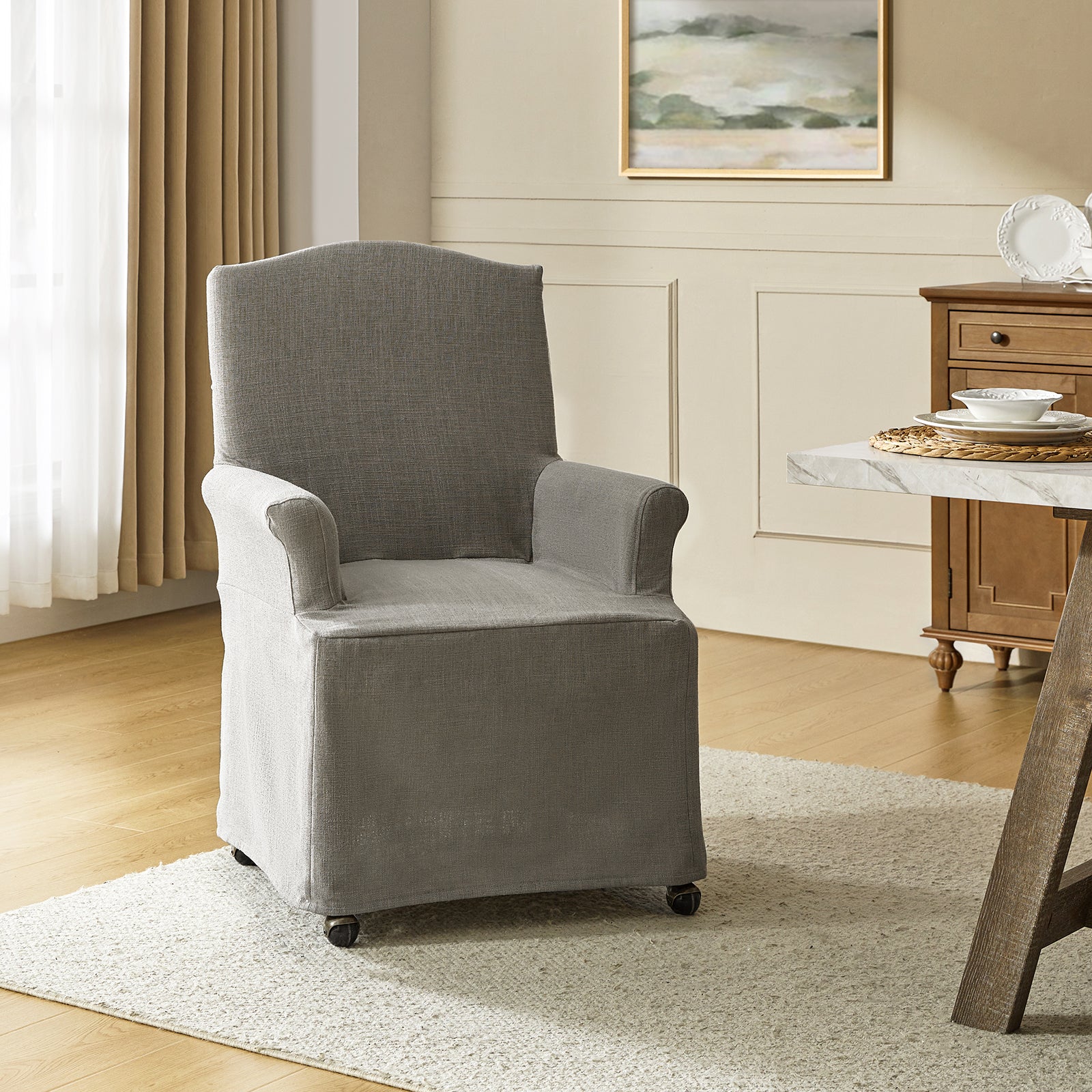 Kanrad Slipcover Dining Chair with Casters in Grey
