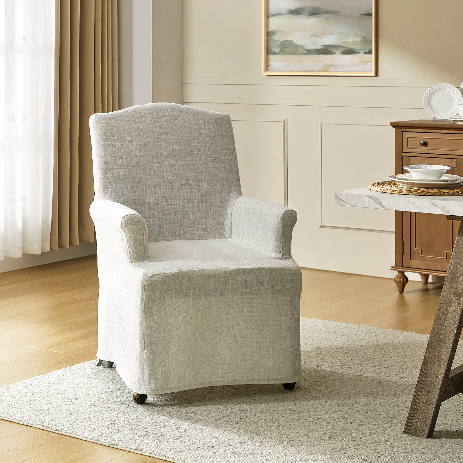 Kanrad Slipcover Dining Chair with Casters in Ivory